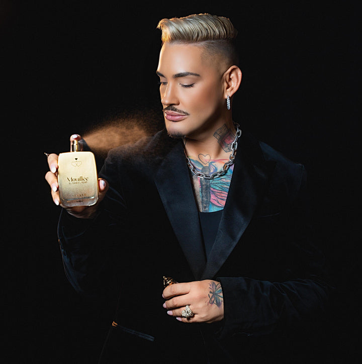Daniel René spraying Mouillée – Ainash Parfums collaboration | Unisex white chocolate gourmand extrait de parfum | As worn by Daniel René